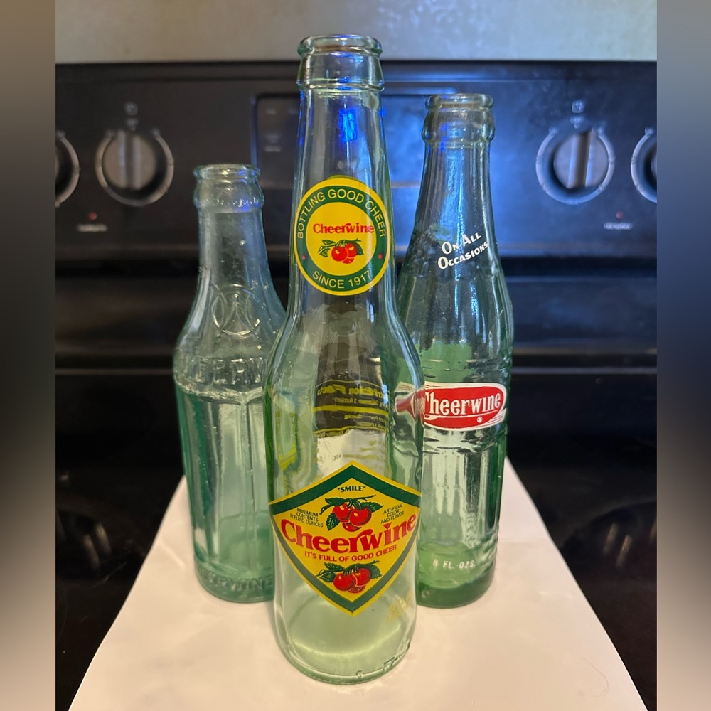 Set of three Cheerwine glass bottles